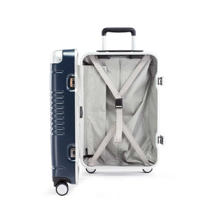 Side view of the frame carry-on max in navy blue showing the interior of the left shell