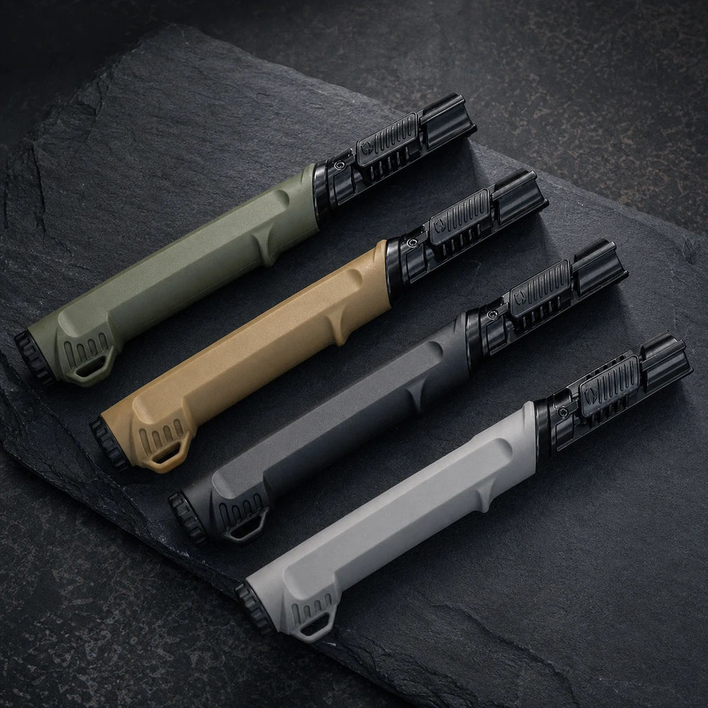 Outdoor ignition tools on a dark charcoal outdoor gear surface
