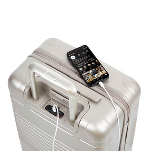 zipper carry-on max in champagne color - phone charging view from top down